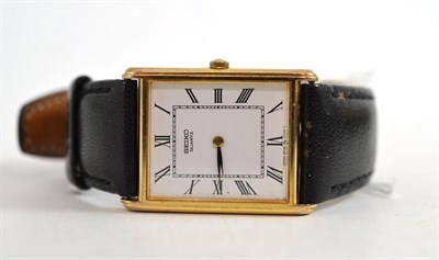 Lot 248 - A 9ct gold Seiko watch with leather strap