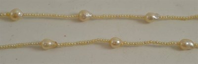 Lot 254 - A seed pearl and pearl necklace