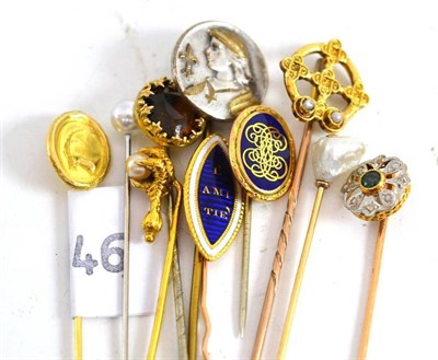 Lot 258 - A collection of ten stick pins