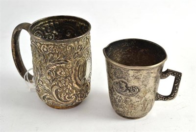 Lot 263 - Two silver mugs (one worn)