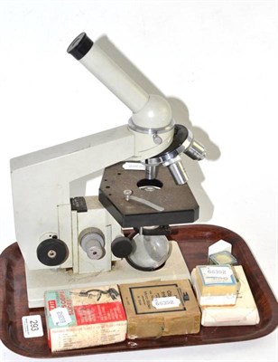 Lot 293 - A microscope and accessories