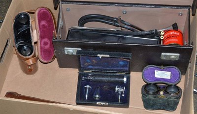 Lot 311 - Two cased pairs of binoculars, a cased tripod, a cased ear inspection touch and other assorted...