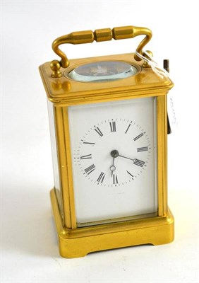 Lot 320 - A brass carriage clock