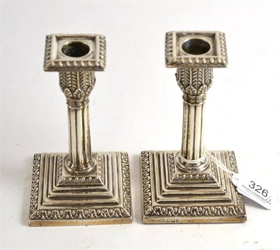 Lot 326 - A pair of Victorian silver candlesticks, John Round & Sons, Sheffield 1894