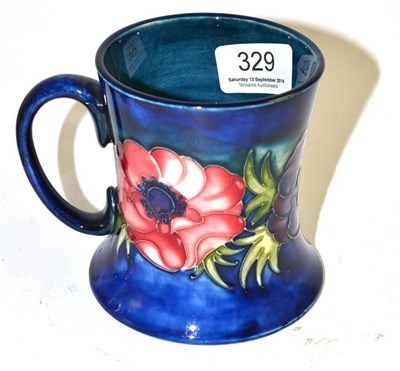 Lot 329 - Walter Moorcroft anemone pattern mug