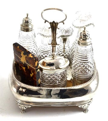 Lot 334 - A George III silver cruet frame and a tortoiseshell card case