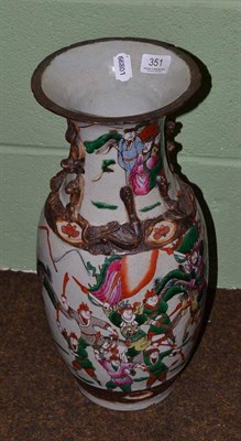 Lot 351 - A Chinese porcelain baluster vase decorated with warriors in the famille verte pallette