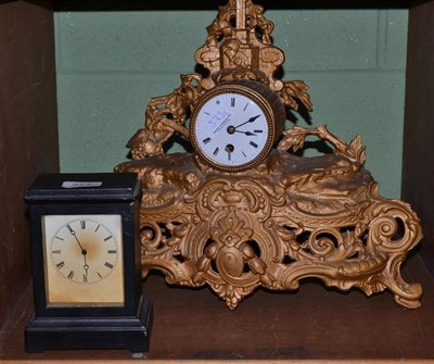 Lot 373 - An ebonised mantel timepiece and a gilt metal timepiece