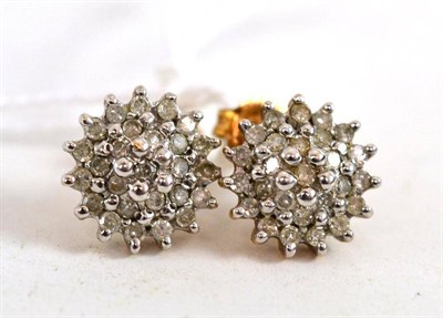 Lot 376 - Pair of diamond cluster earrings, stamped '9K'