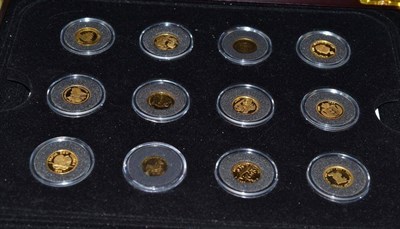 Lot 384 - Twelve Royal Mint gold coins, cased