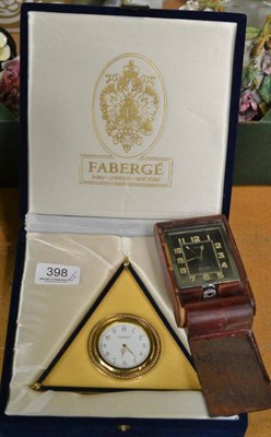 Lot 398 - Faberge clock and travel clock