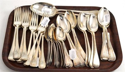 Lot 429 - A part set of Old English pattern silverware comprising twelve dessert spoons, two serving...