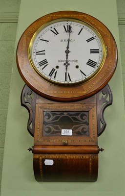 Lot 538 - An inlaid striking wall clock