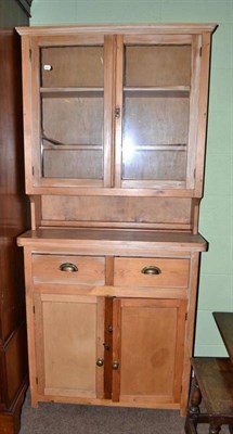 Lot 542 - A small pine dresser with glazed superstructure