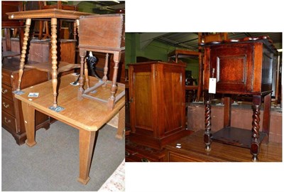 Lot 548 - A blonde oak dining table, an oak occasional table, an oak bedside cupboard and a walnut...