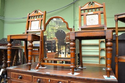 Lot 555 - A pair of Victorian oak tile-back hall chairs, a circular-topped table on three cast iron...