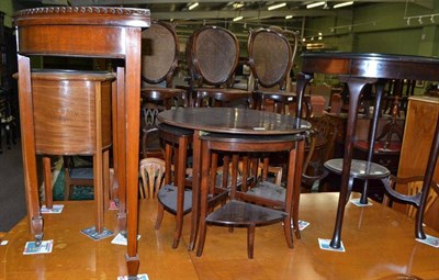 Lot 561 - A mahogany fold over card table, a nest of tables, a mahogany planter and an occasional table (4)