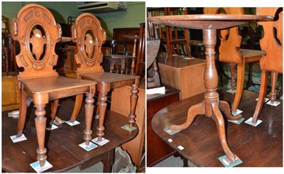 Lot 567 - Early 19th century oak pedestal table and a matched pair of Victorian hall chairs (ex. Wesley...