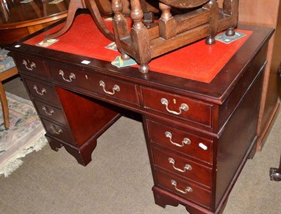 Lot 570 - A reproduction pedestal desk