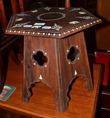 Lot 576 - An Indian rosewood table inlaid with elephants