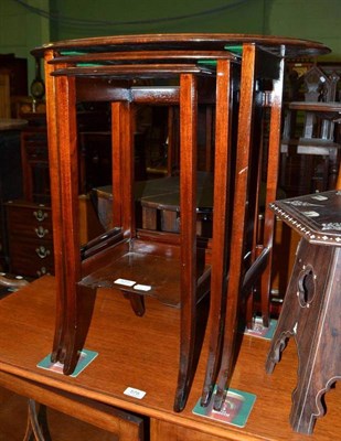 Lot 577 - Nest of three mahogany coffee tables