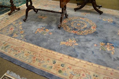 Lot 580 - A small Chinese washed wool carpet