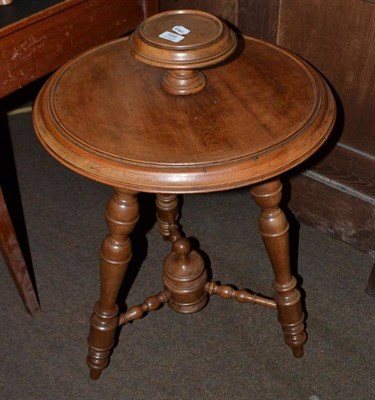 Lot 586 - 19th century turned elm three legged table