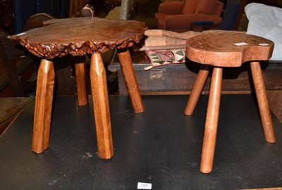 Lot 587 - Two burr elm stools, each on oak legs