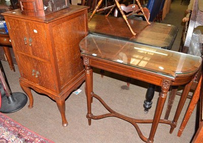 Lot 589 - Two reproduction mahogany hall tables and an oak cabinet