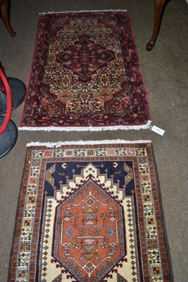 Lot 590 - A Narrow Sarab runner, North West Persia, the field with a column of lozenge medallions enclosed by