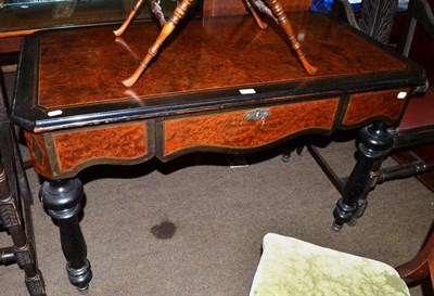 Lot 597 - A Victorian ebonised and amboyna side table