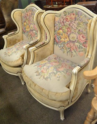 Lot 617 - A pair of upholstered armchairs