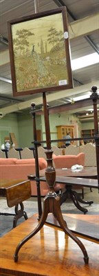 Lot 631 - A mahogany pole screen