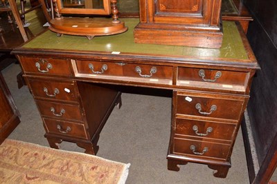 Lot 641 - A reproduction mahogany pedestal desk