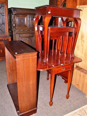 Lot 644 - A reproduction yew wood Pembroke table, a nest of tables, a mahogany side table and an open...