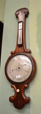 Lot 649 - A walnut wheel barometer