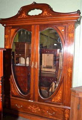 Lot 651 - An Edwardian inlaid double wardrobe