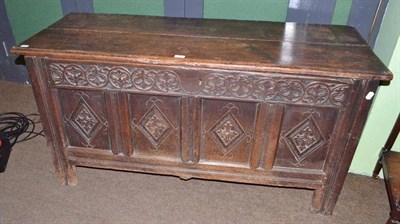 Lot 660 - A panelled oak 18th century coffer