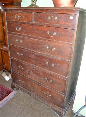 Lot 665 - An oak six height chest of drawers