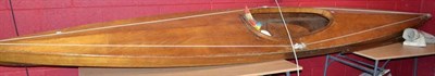 Lot 684 - A vintage wooden canoe; a wooden rudder, tiller and sail