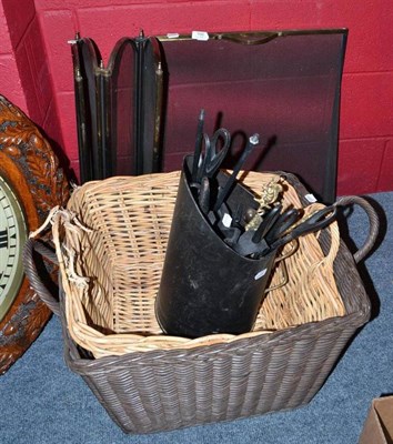 Lot 706 - Two brass spark guards, two baskets, coal helmet and assorted fire implements