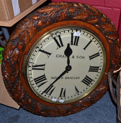 Lot 712 - Carved oak framed wall clock, dial inscribed 'GRANT & SON NORTH SHIELDS' *Grant & Son was a...