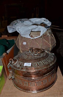 Lot 714 - Pakistan copper paan box, Pakistan tribal pot drum and a collection of Malaysian shadow puppets