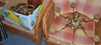 Lot 720 - Assorted brass comprising a pair of candlesticks, beam balance, light fitting, hot water can,...