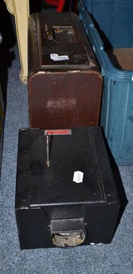 Lot 742 - A steel shotgun safe and a vintage sewing machine in case