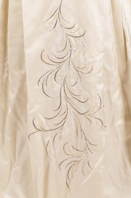 Lot 2111 - A 1962 Jean Varon Wedding Dress, in cream silk...