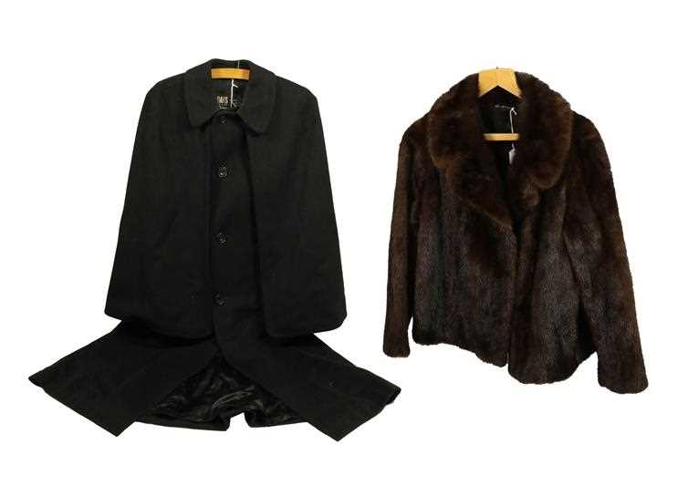 Lot 2124 - Daks Simpson Piccadilly Black Wool Cape, with...