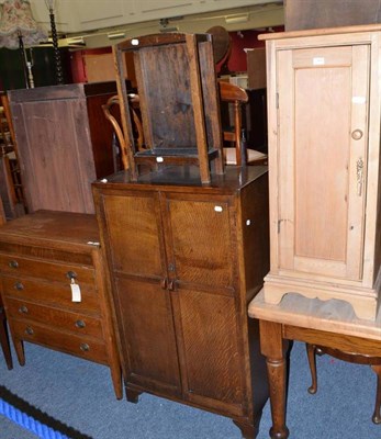 Lot 765 - Victorian pine cabinet, 1950's oak linen cupboard, stick stand and oak straight four drawer...