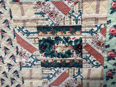 Lot 2028 - Mid 19th Century Patchwork Quilt, with a...