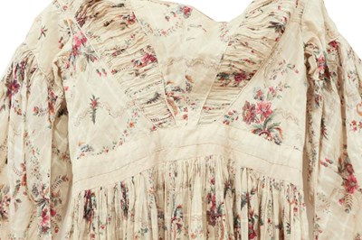Lot 2061 - An Early 19th Century Printed Cotton Dress,...